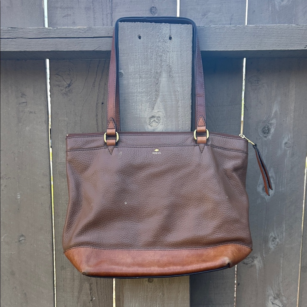 Fossil hobo shoulder bag features a textured leather body